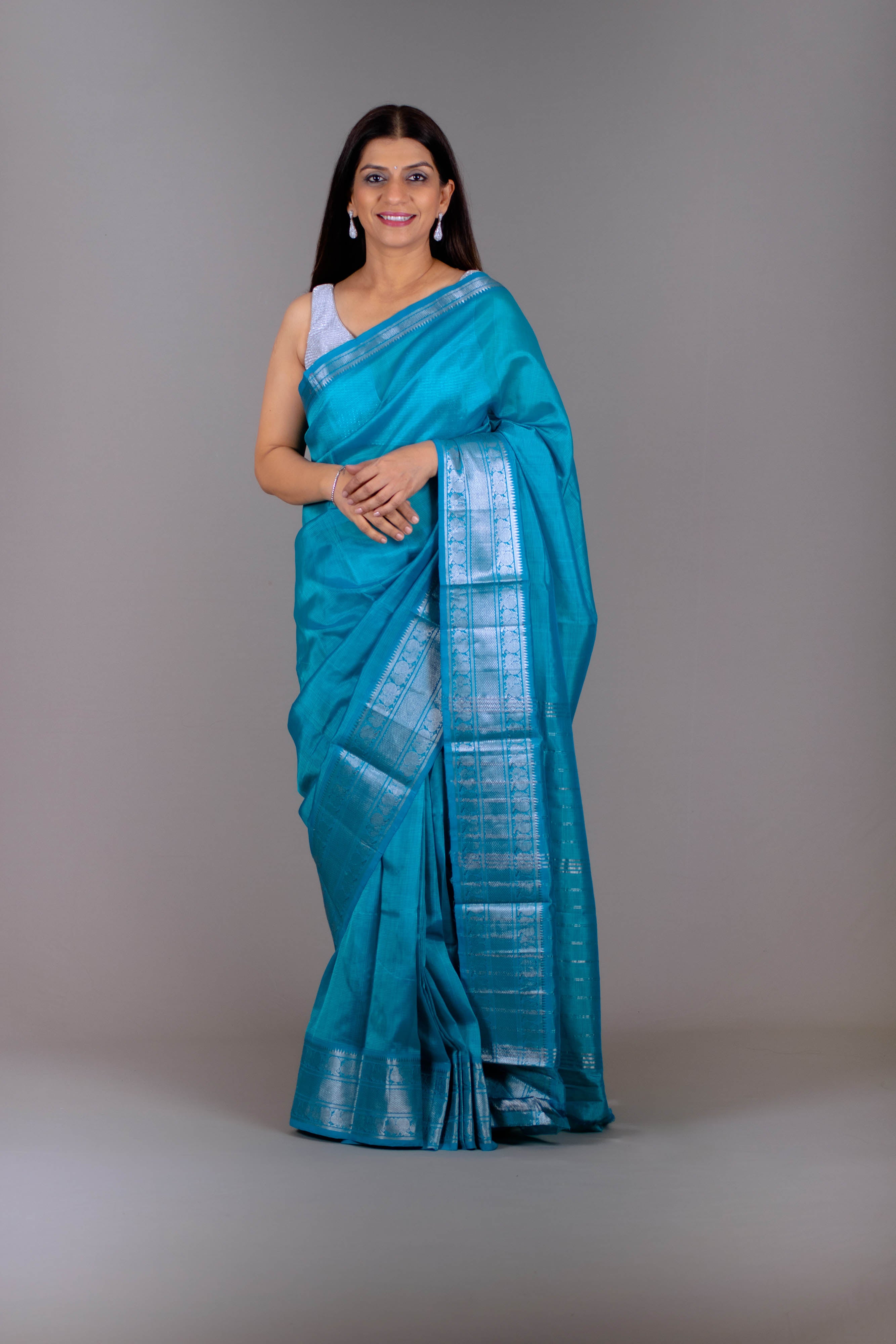 Jiya Pure Venkatagiri Silk Pattu Saree in Caribbean Blue with Silver Gadwal Border - Indian Handloomz