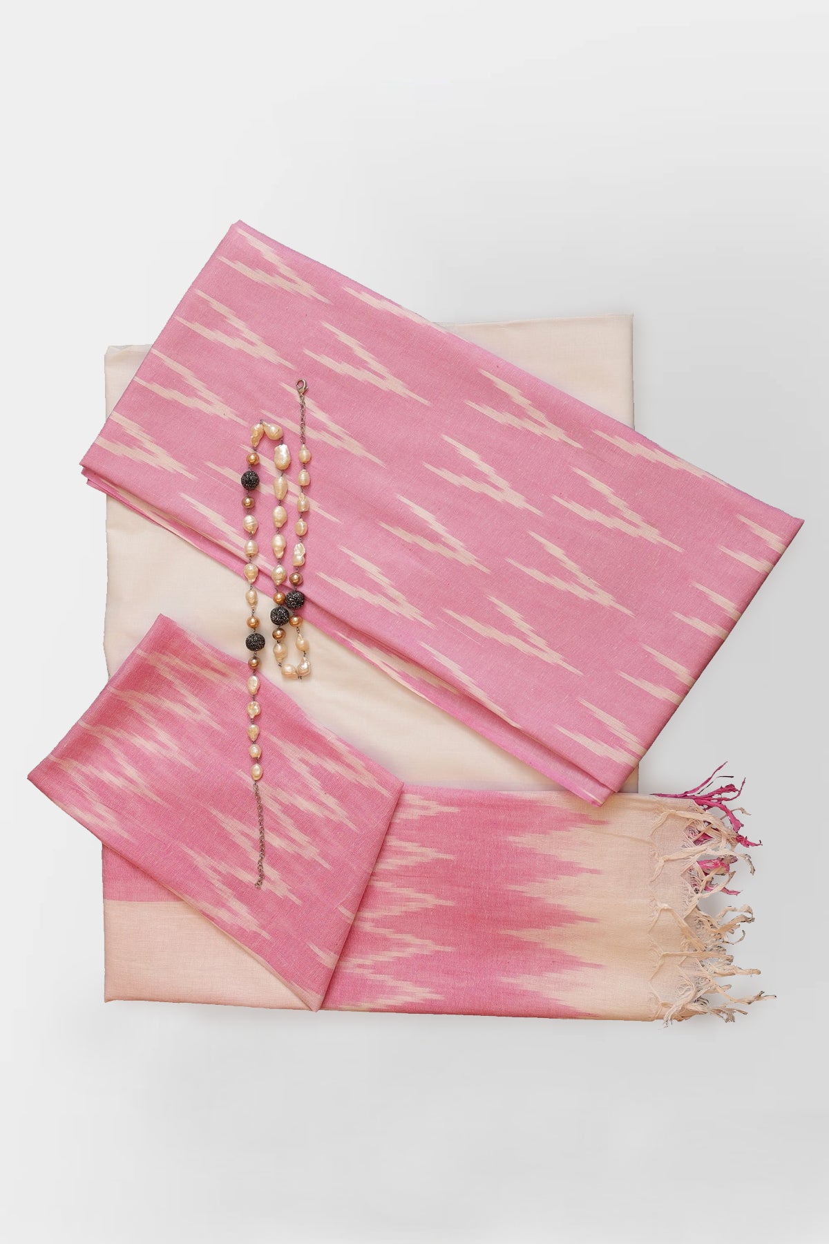 Aishani Pure Cotton Ikkat Weave Unstitched Suit Set in Pink & White Colour - Indian Handloomz