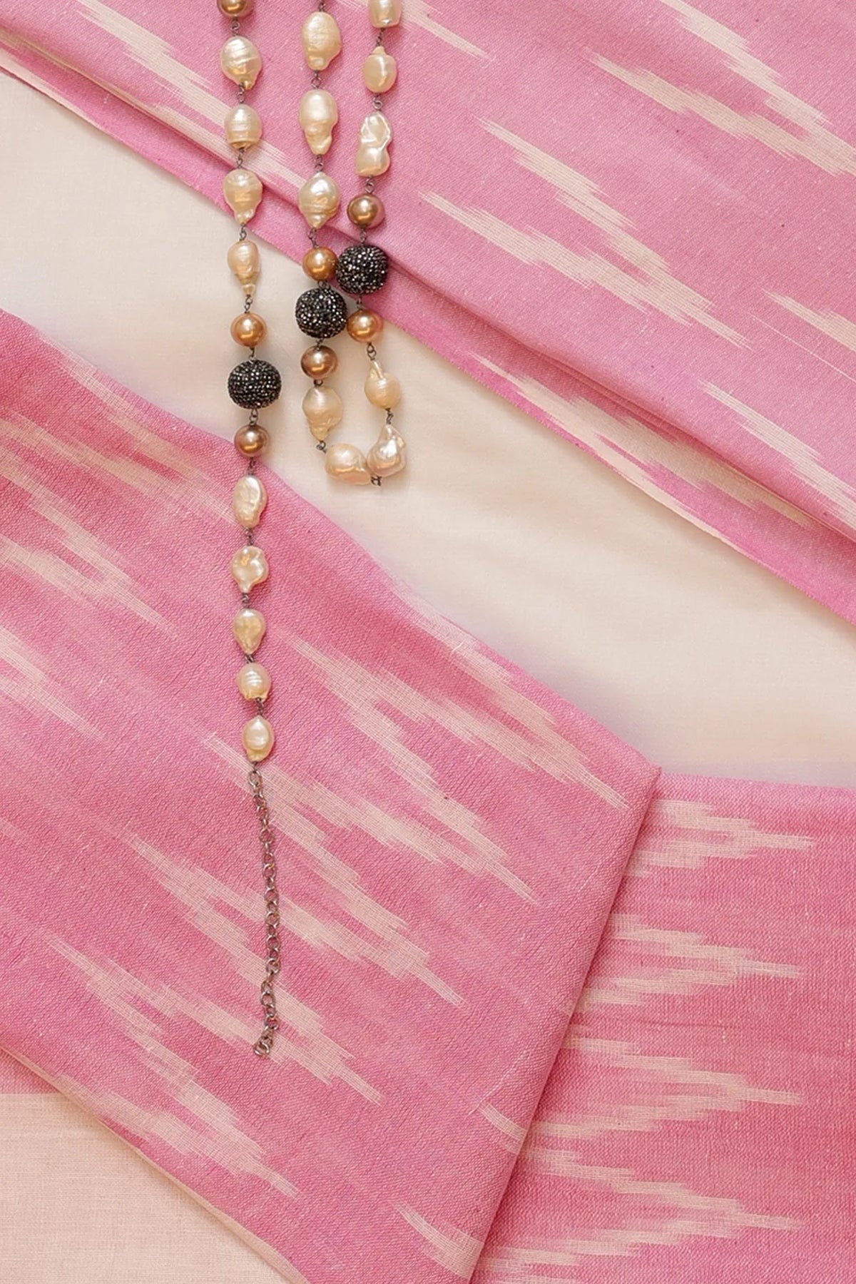 Aishani Pure Cotton Ikkat Weave Unstitched Suit Set in Pink & White Colour - Indian Handloomz