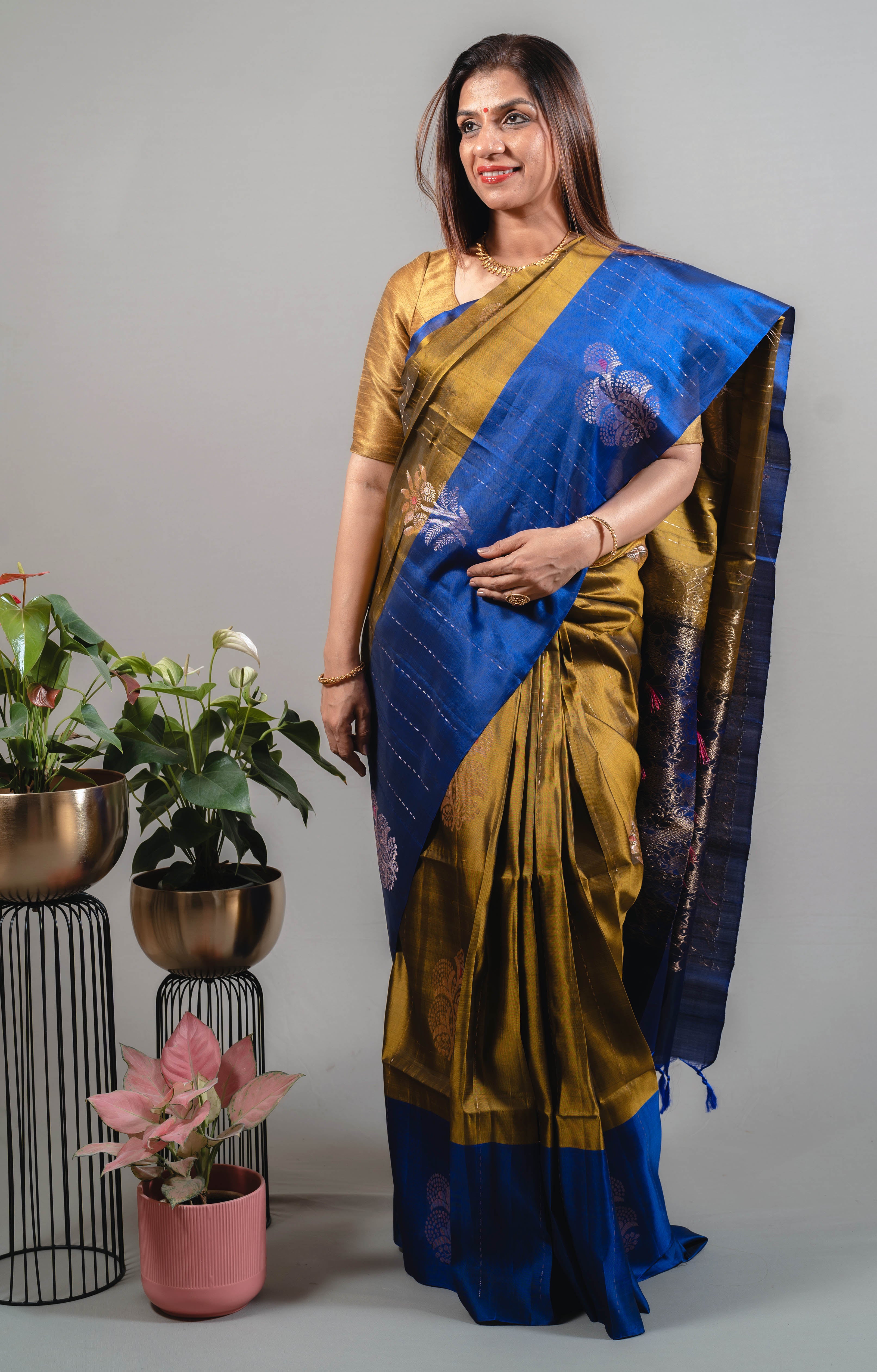 Suchi Dual Colour Pure Silk Kanjivaram Saree in Greenish Gold with Royal Blue & Silver Zari