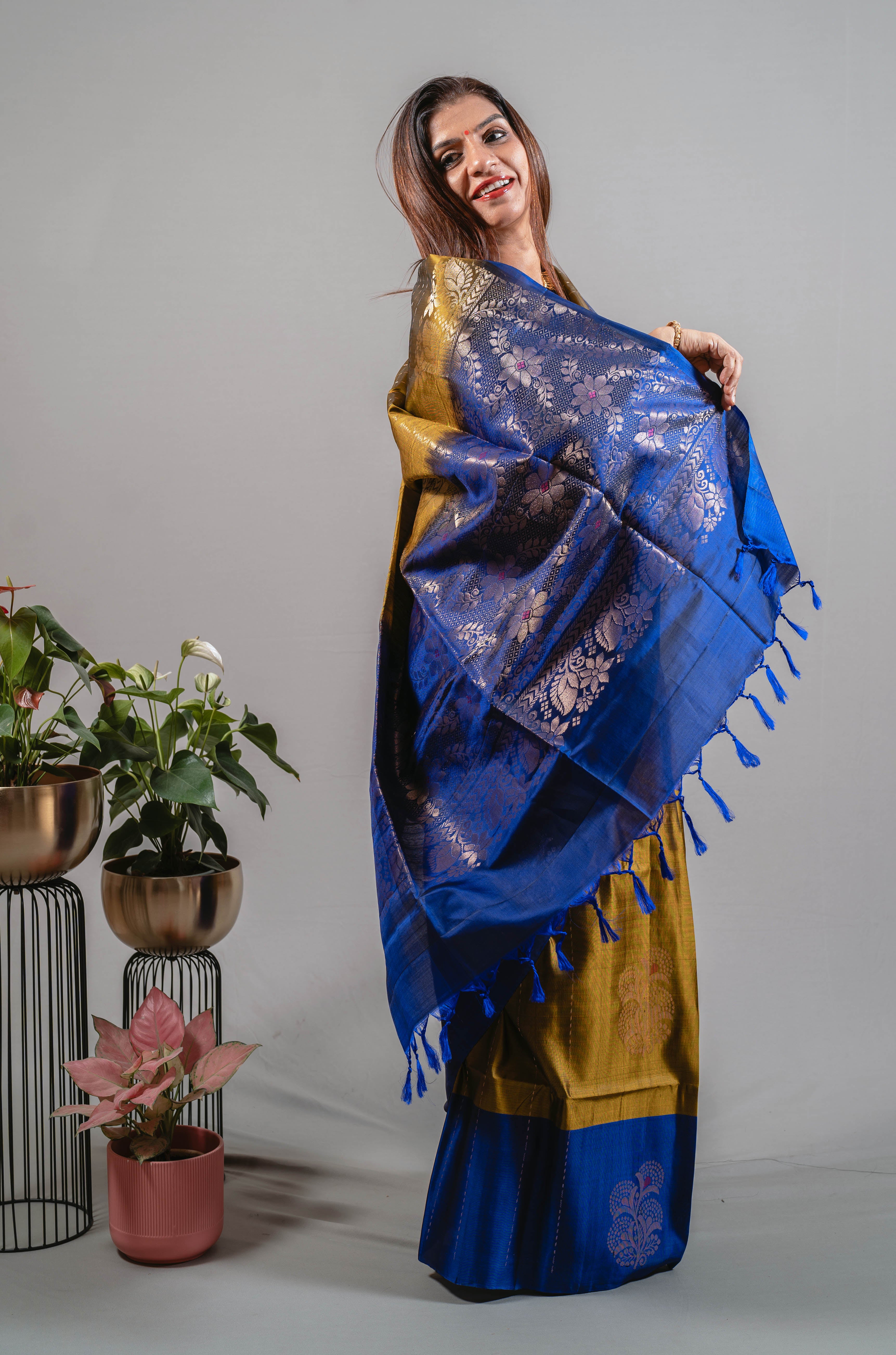 Suchi Dual Colour Pure Silk Kanjivaram Saree in Greenish Gold with Royal Blue & Silver Zari