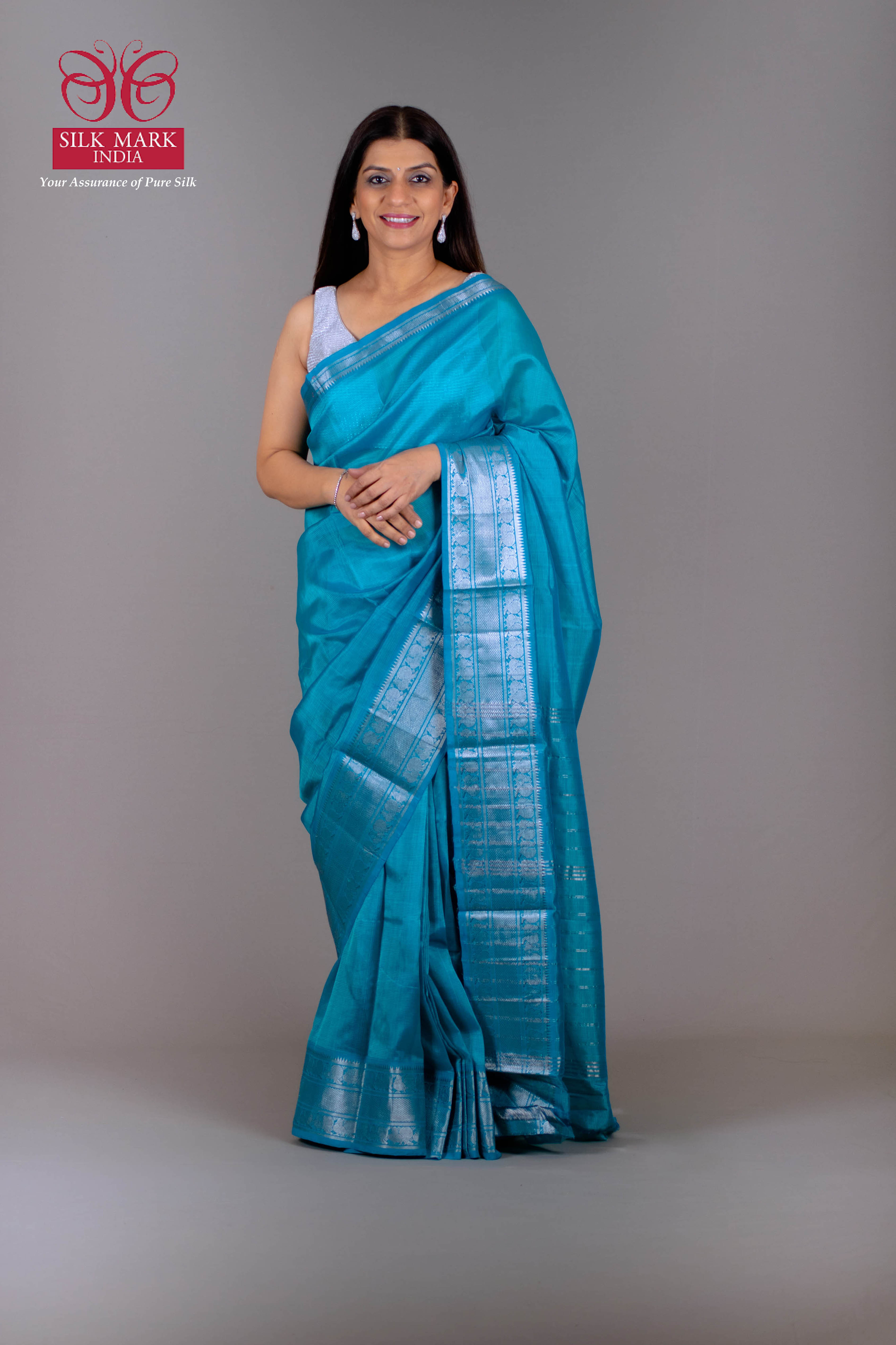 Jiya Pure Venkatagiri Silk Pattu Saree in Caribbean Blue with Silver Gadwal Border - Indian Handloomz