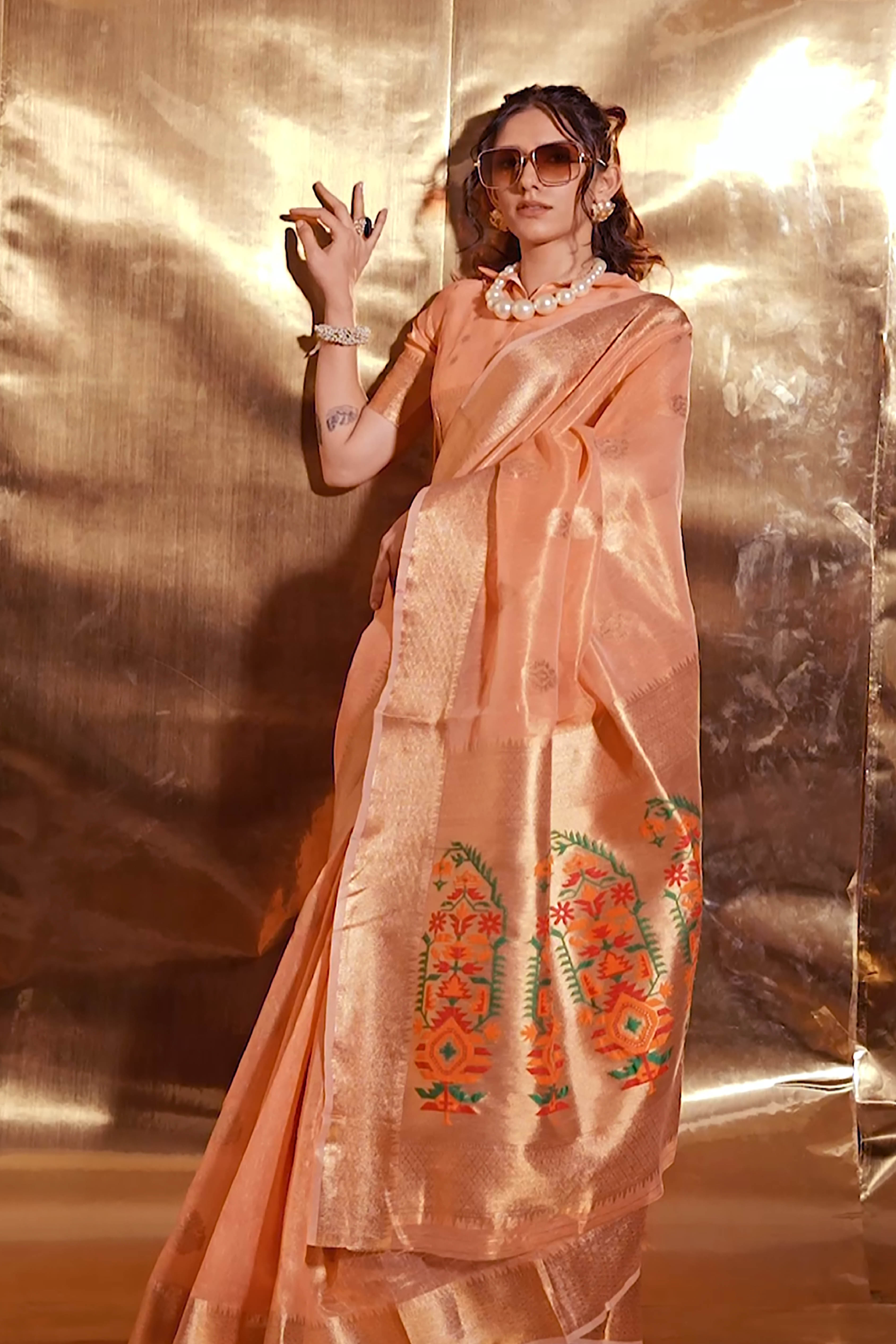 Vidhatri Tissue Linen Paithani Saree in Peach Colour with Zari & Thread Woven Pallu.