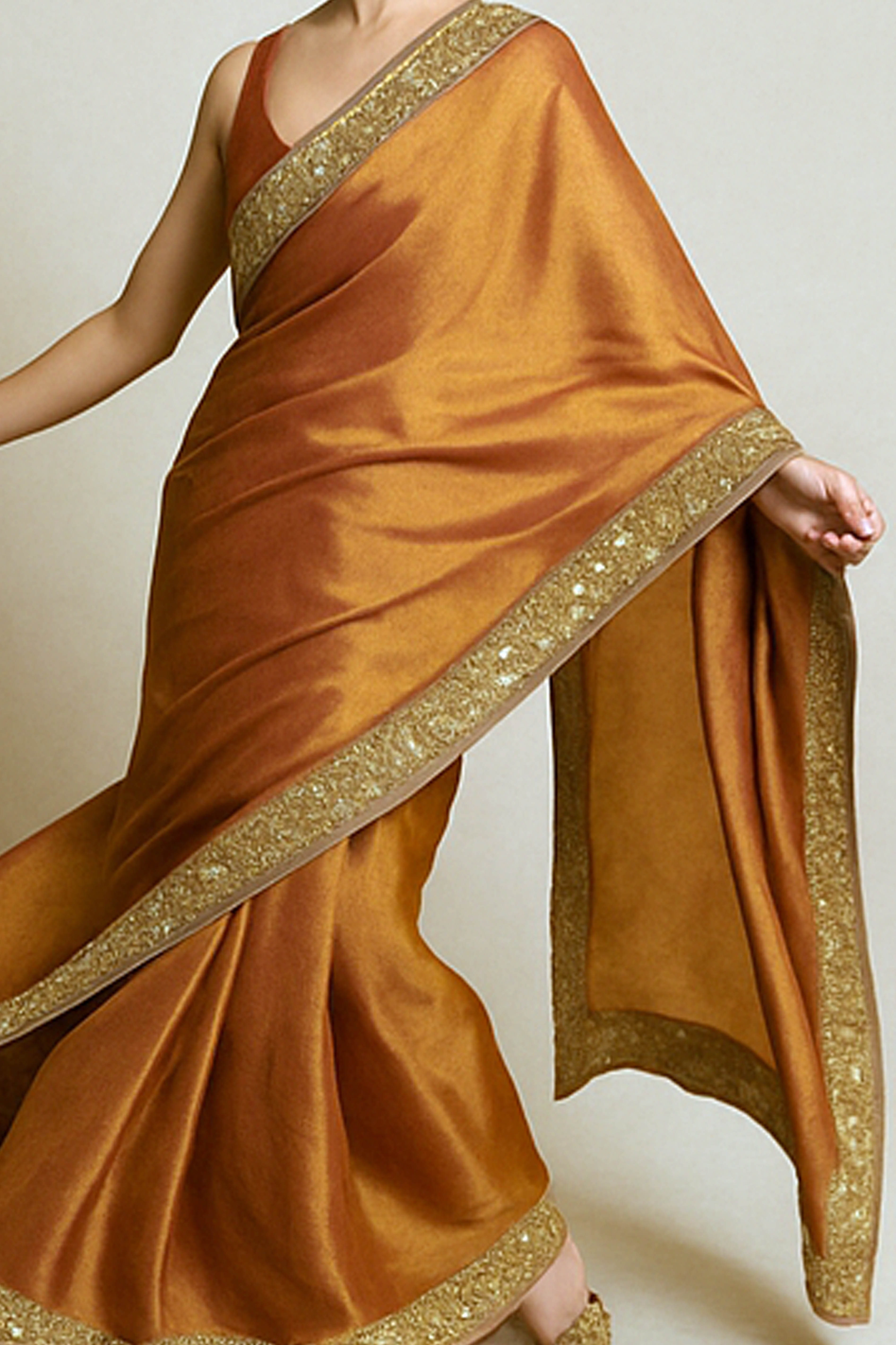 Arpita Pure Tissue Linen Saree in Orange & Gold Shades with Zardosi Border - Indian Handloomz