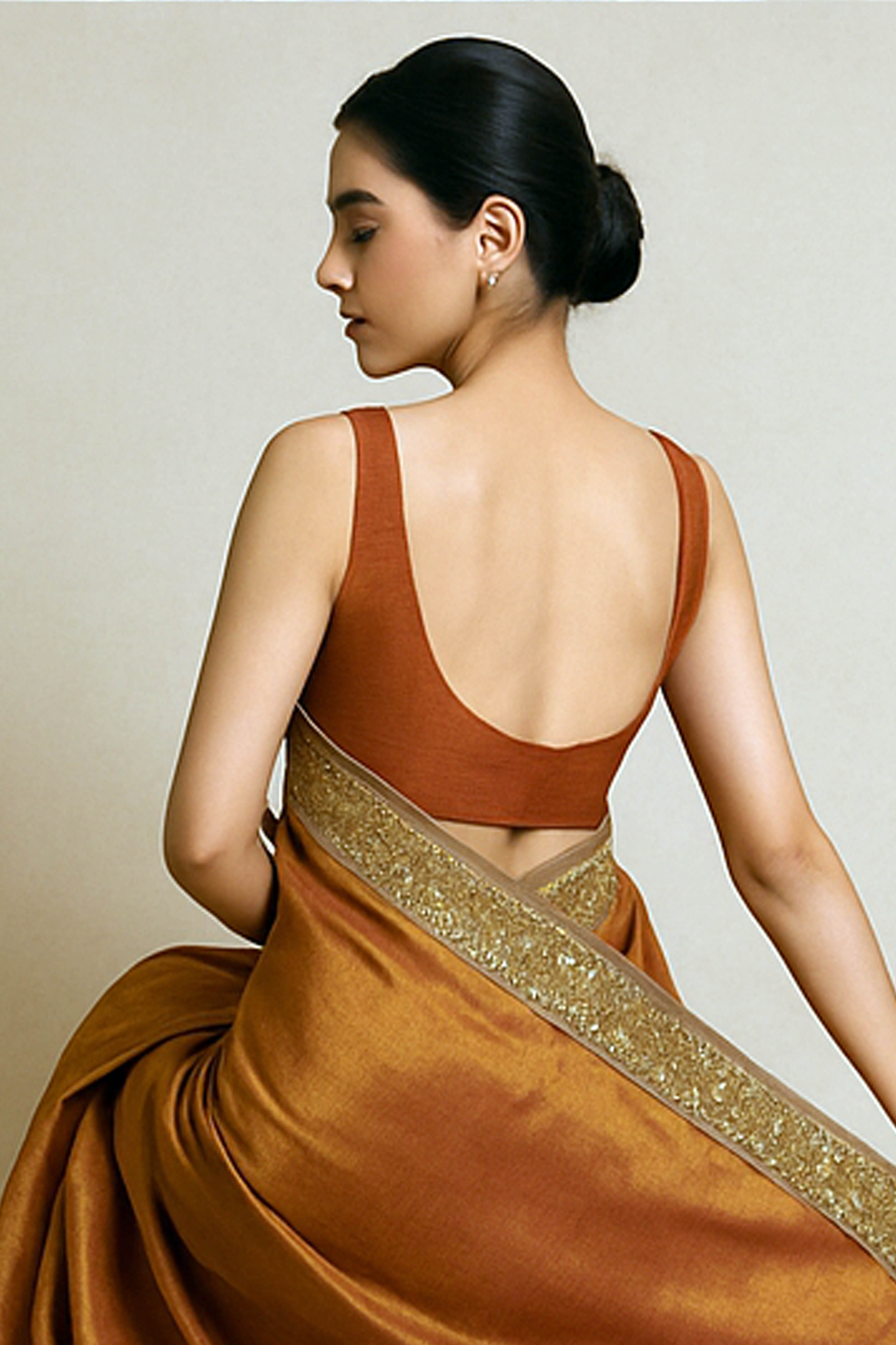 Arpita Pure Tissue Linen Saree in Orange & Gold Shades with Zardosi Border - Indian Handloomz