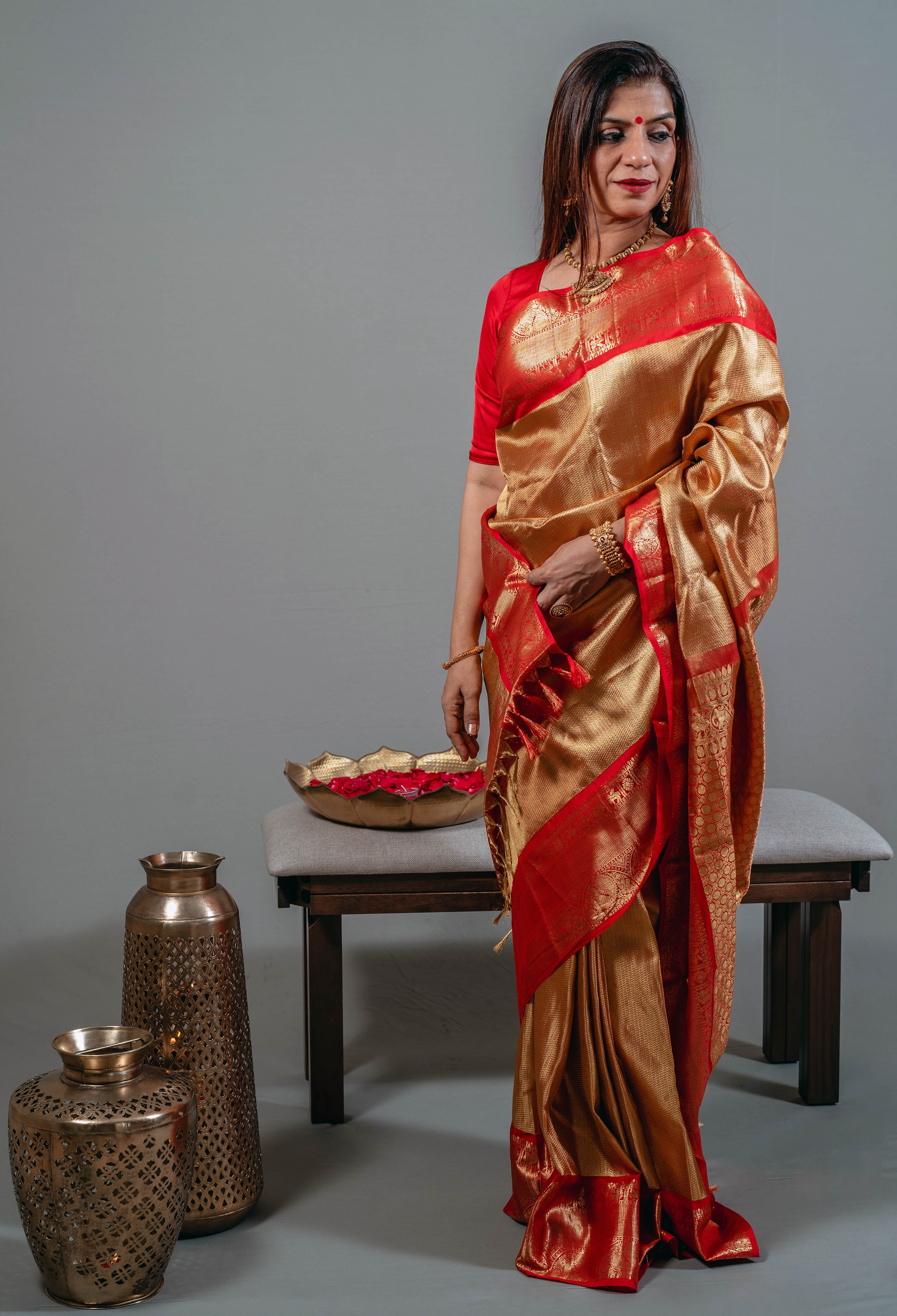 Ambika Bridal Kanchi Silk Saree in Bright Gold with Kumkum Red Border & Animal Motifs