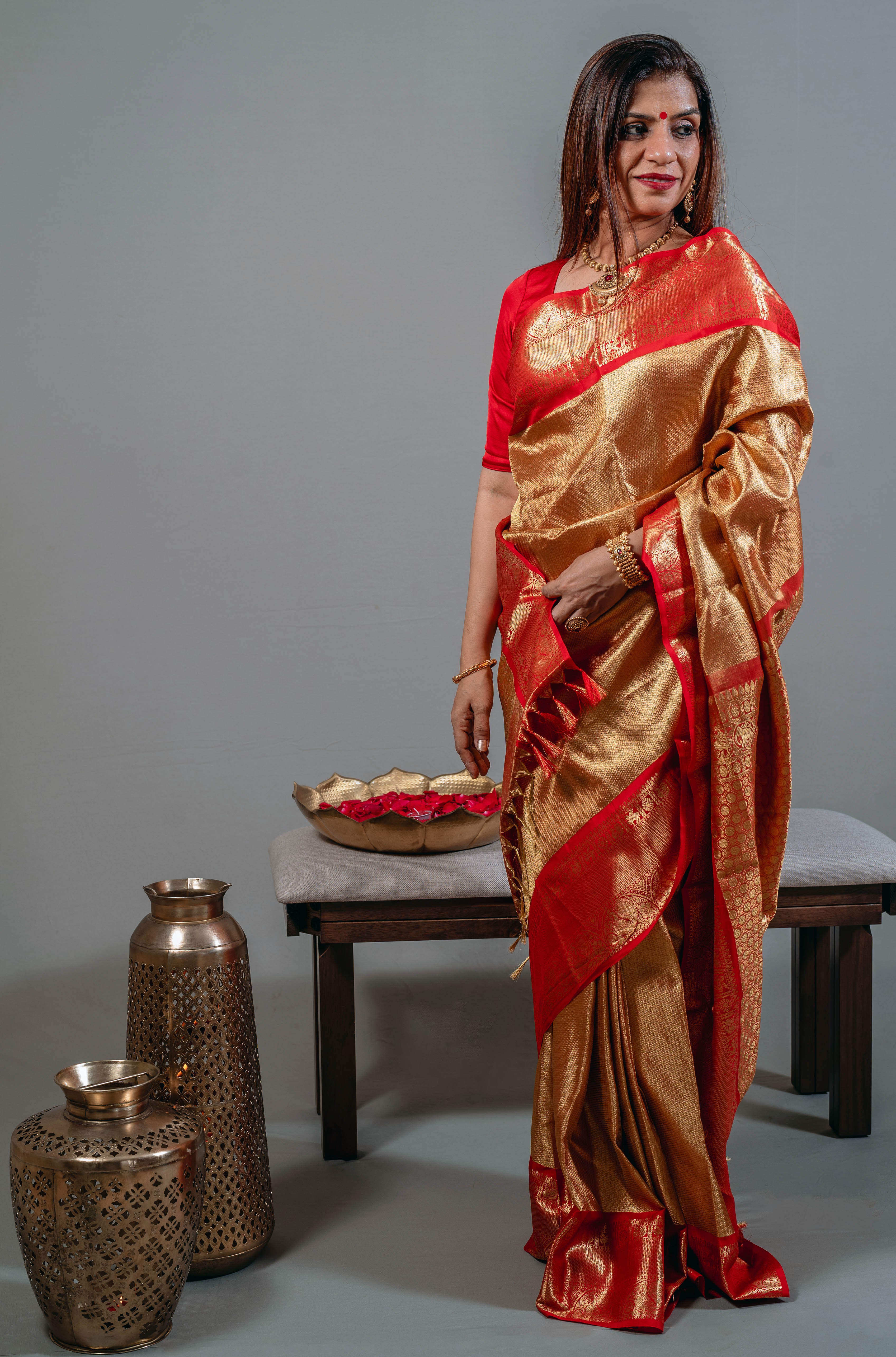 Ambika Bridal Kanchi Silk Saree in Bright Gold with Kumkum Red Border & Animal Motifs