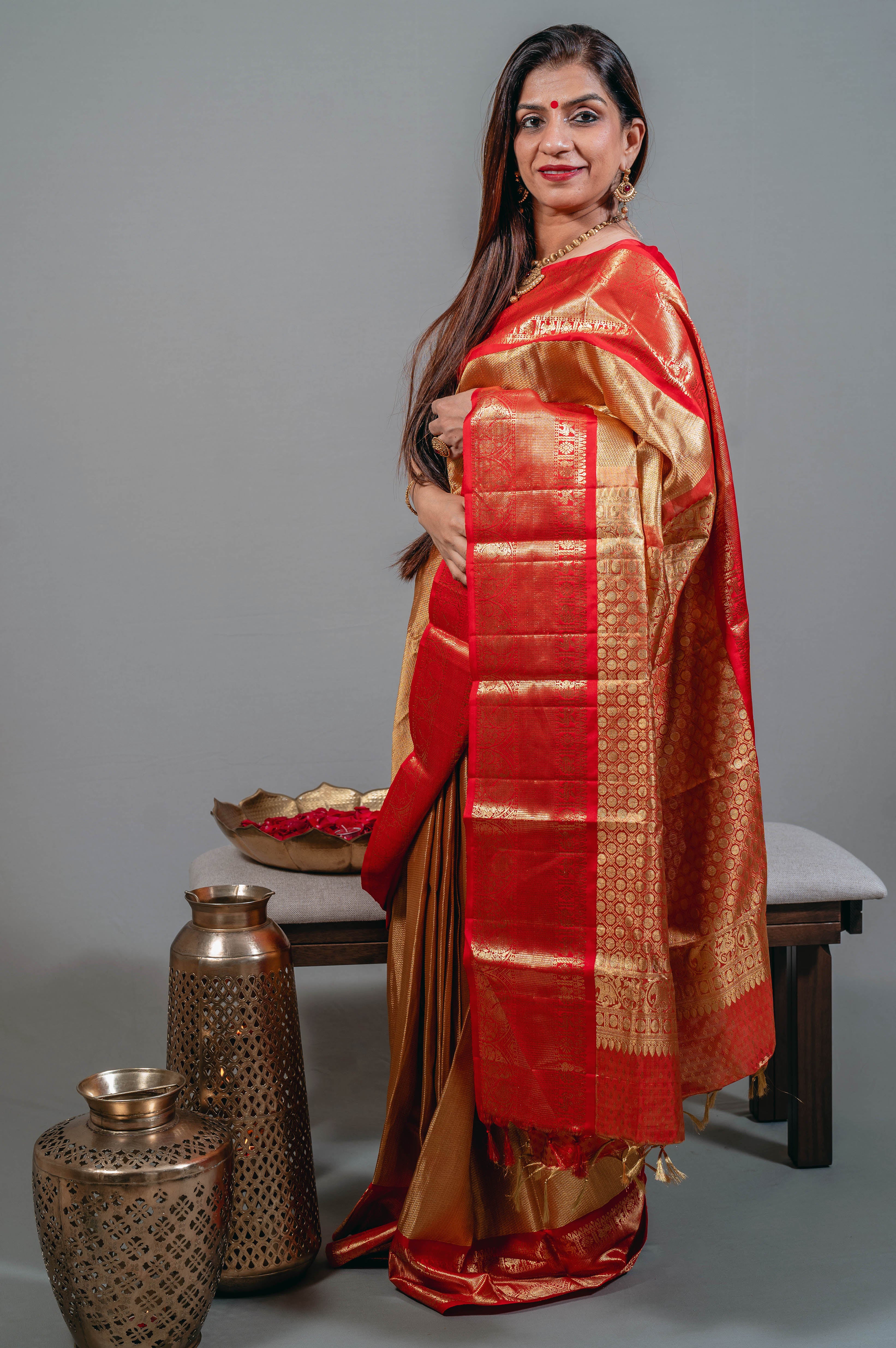 Ambika Bridal Kanchi Silk Saree in Bright Gold with Kumkum Red Border & Animal Motifs