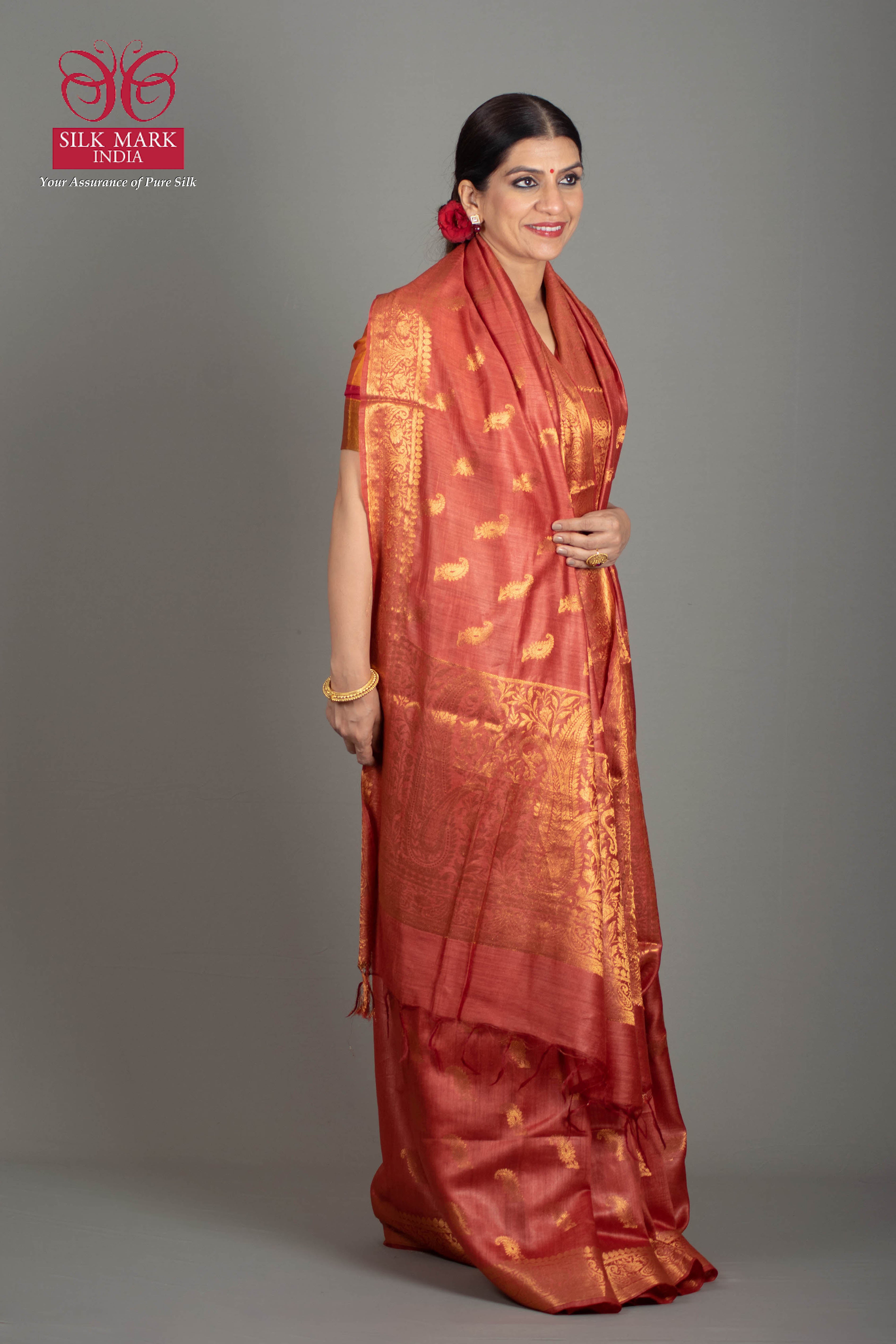 Charvi Pure Moonga Tussar Silk Saree in Coral Red Colour with Golden Paisley Butas - Indian Handloomz