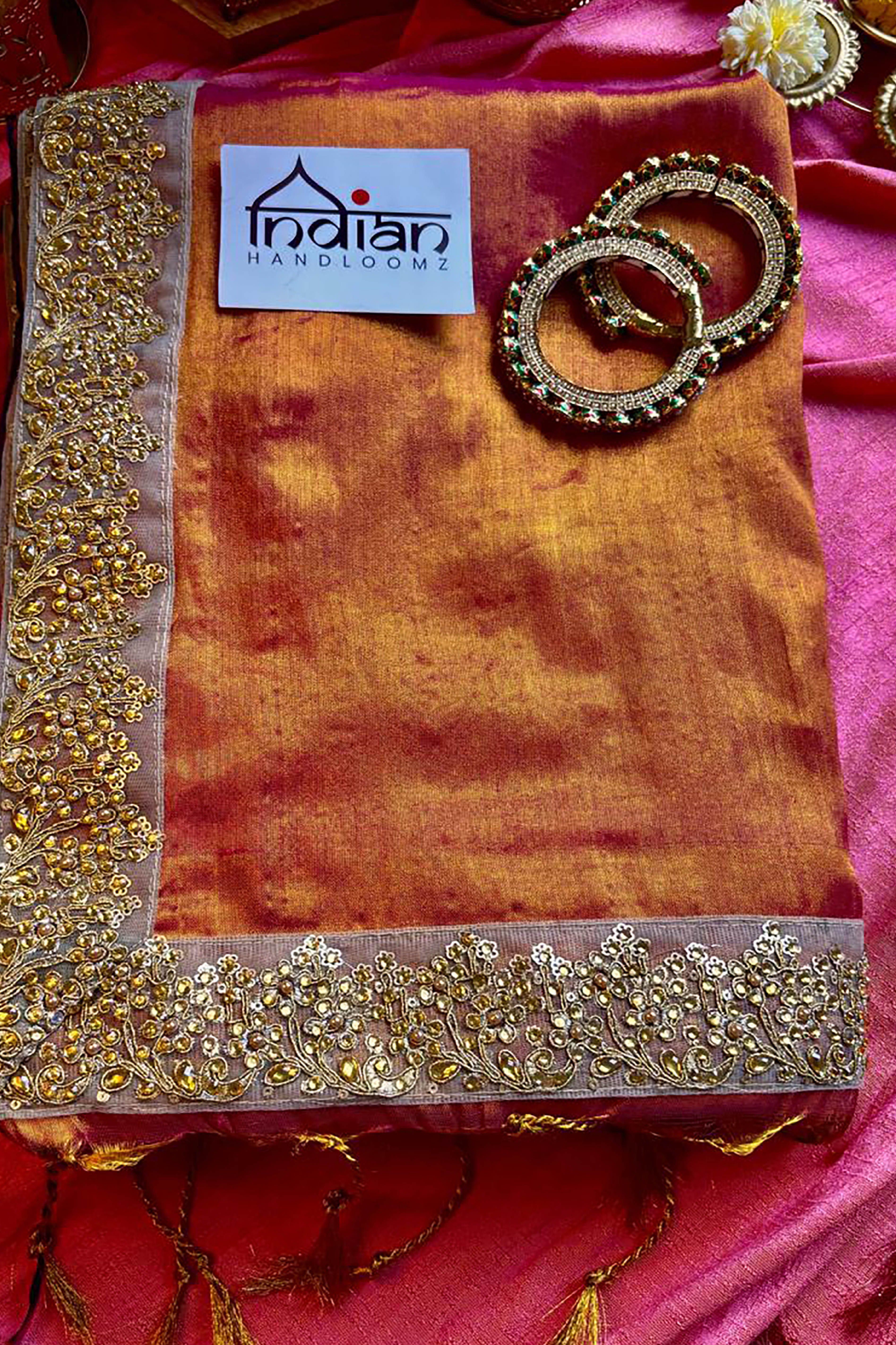 Arpita Pure Tissue Linen Saree in Orange & Gold Shades with Zardosi Border