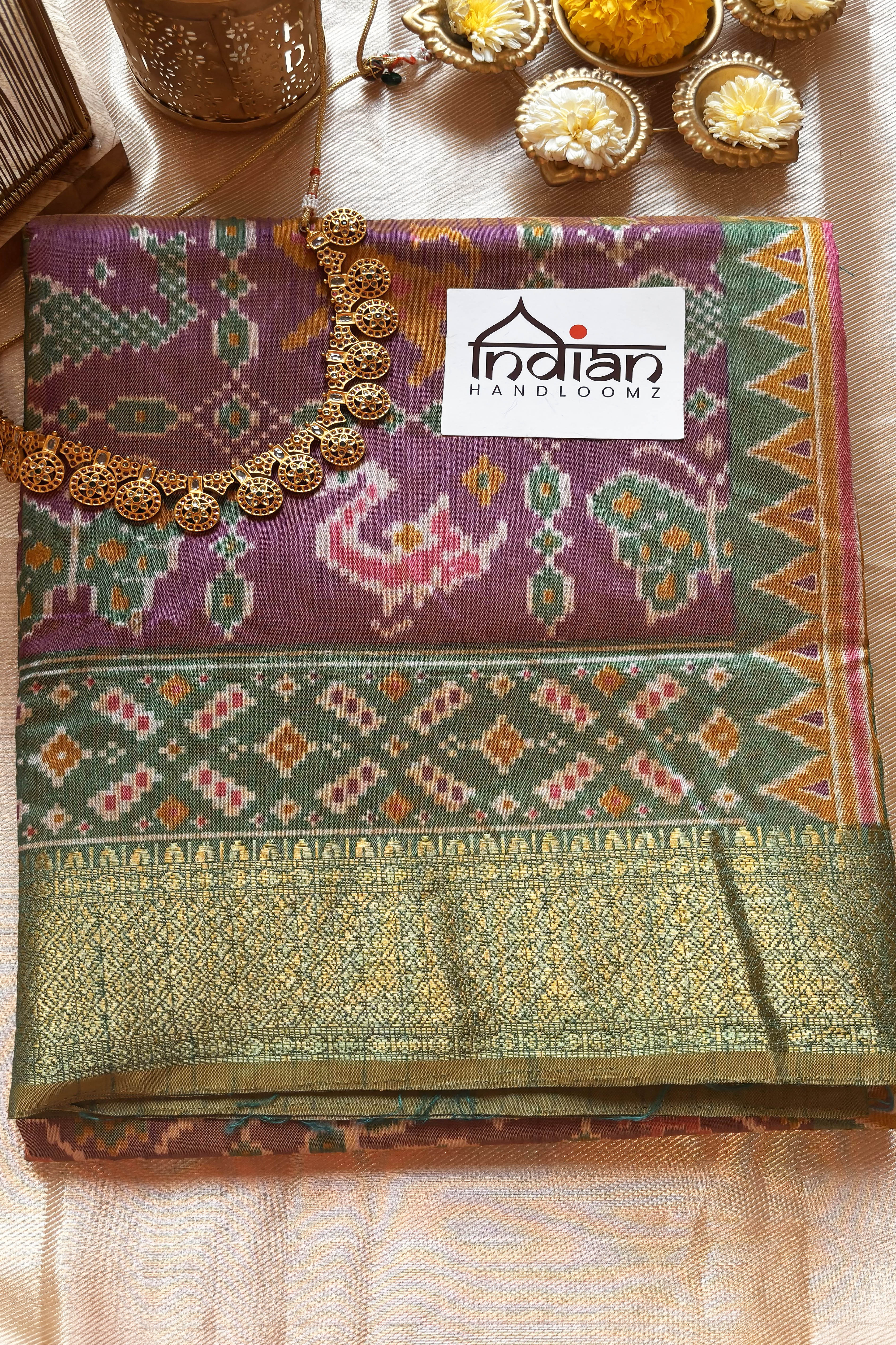 Anindita Patola Saree in Dual Tones of Purple & Gold